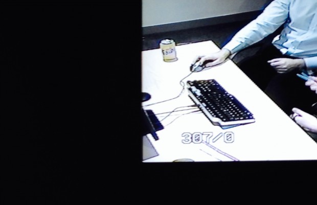 user research lab video image with white surface glare