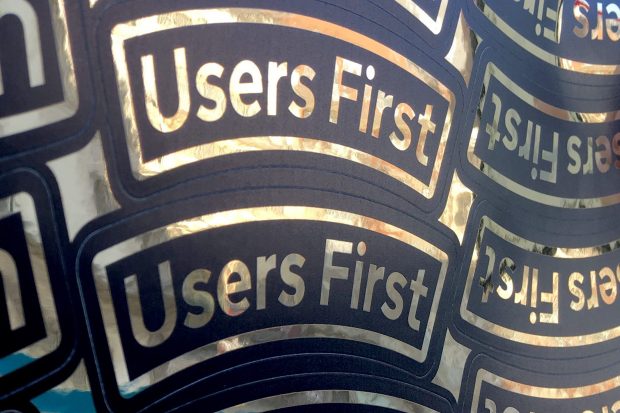 Sticker sheet showing "Users First"