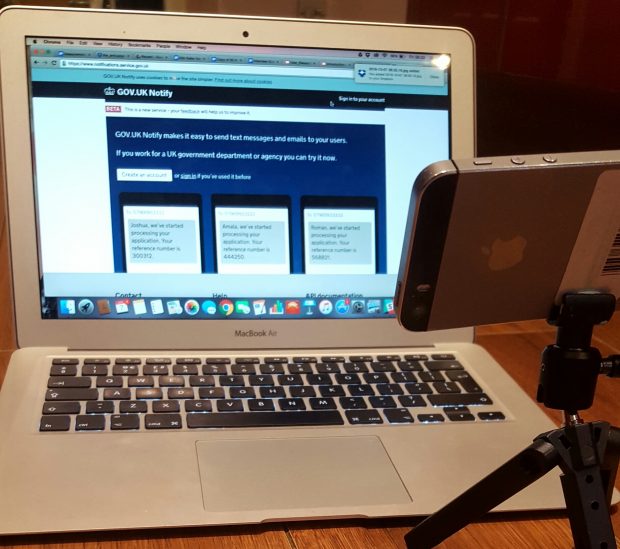 Setup for streaming remote research with laptop and mobile on a stand