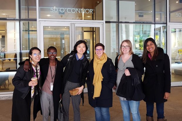 The author, Stephanie Marsh, standing outside the Canadian Digital Service building with of its five employees.